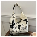 Cremefarbene Canvas-Schultertasche mit schwarzen Schmetterlings- und Blumenmustern, elegant - Regenbogen