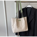 Creamy checkered tote bag with green fashion label and silver chain strap detail - Green