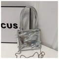 Close-up of metallic silver bucket bag with 3D bow details and beaded chain strap - Silver