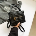 Elegant black crocodile-embossed PU leather tote bag with gold zipper and shoulder strap - Black