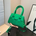 Bright green crocodile embossed handbag with sleek top panel and double handles - Green