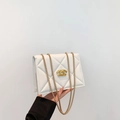 Elegant white quilted chain bag with gold metal interlaced logo and a textured finish - White