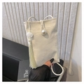 Detail of cream mini crossbody bag with pearl buckle and elegant tassel charm - White
