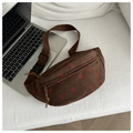 Detail of brown corduroy saddle bag with strawberry print on a white sofa background - Brown