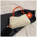 Puffy cloud bag with bubble texture in cream white featuring orange rope handle and flower charm - White and Orange