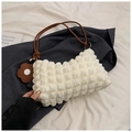 Creamy white bubble textured shoulder bag with floral pendant and brown strap - White and Brown