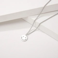 Minimalist titanium steel necklace featuring a hollow smiley face pendant on a chain - Smiley Face (T0113)