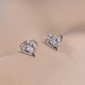 Elegant silver heart-shaped stud earrings featuring a large brilliant cubic zirconia center - Heart Stud Earrings Set Style (E385)