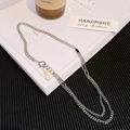 Collana a doppio strato in argento con ciondolo nero e targhetta logo del brand - Collana a Doppio Strato (T0157)