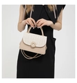 Detail of minimalist cream crossbody bag with textured herringbone pattern flap and metal lock - Khaki