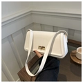 Detail shot of a white faux leather shoulder bag featuring a gold rectangular twist lock - White