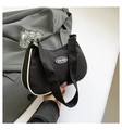 Lightweight black nylon shoulder bag with white piping and minimalist crescent shape - Black
