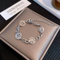 Hip-hop titanium steel chain bracelet with hollowed smiley and sad face charms - Emoji Bracelet (TS 043)