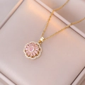 Collana in acciaio dorato con ciondolo a fiore rotante, cristalli rosa e strass lucidi - Collana Rotante In Zircone Rosa Oro