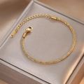 Elegante bracciale da donna in acciaio al titanio dorato con chiusura a moschettone - Stile Gypsophila Oro