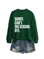 Detail of loose dark green sweatshirt with white Ski Season slogan and denim shorts - Dark Green (White Font)