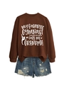 Flat lay of brown hoodie with My Favorite Gymnast calls me Grandma text and denim shorts - Coffee Sweatshirt (White Font)