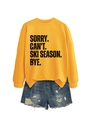 Detail of yellow cotton sweatshirt with black Ski Season print and blue ripped denim shorts - Yellow (Black Text)