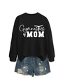 Detail of Gymnastics MOM sweatshirt with vintage frayed denim shorts on white background - Black (White Font)