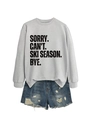 Detailed view of grey sweatshirt with Sorry Can't Ski Season print and ripped denim shorts - Grey (Black Font)