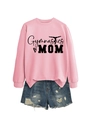 Flat lay of pink Gymnastics MOM sweatshirt paired with distressed denim shorts - Pink (Black Print)