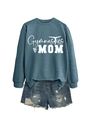 Flat lay of Gymnastics Mom blue sweatshirt and ripped denim shorts on white background - Blue (White Font)