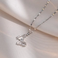 Silver butterfly necklace with crystal wings and zircon detailing on a silk background - Butterfly Necklace (X2604)