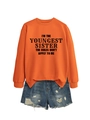 Orange sweatshirt with I'm The Youngest Sister slogan paired with denim shorts - Orange (Black Font)