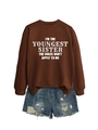 Detail of loose-fit brown sweatshirt with white slogan print and ripped denim shorts - Coffee (White Font)