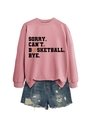 Flat lay of pink crewneck sweatshirt with basketball slogan and distressed denim shorts - S / Rose Gold (Black Letters)