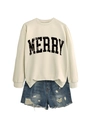 Detail of MERRY slogan on off-white sweatshirt paired with distressed denim shorts - Sand (Black MERRY)