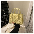 Light yellow four-leaf clover embossed handbag with handles and detachable crossbody strap - Yellow