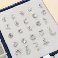 Silver crescent moon and star zircon ear studs collection on light grey velvet tray - Pave Zirconia Moon Style (EGD1299)