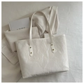 Creamy white tote bag with bamboo crinkle texture and gold rivet hardware details - No Pendant / Off White