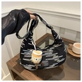 Detail of black crescent bag with rainbow wave embroidery and plush coffee cup charm - With Plush Charm / Black
