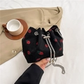 Corduroy bucket bag with strawberry pattern, chain strap and pearl drawstring detail - Black