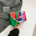 Green leather crossbody bag with vibrant colorful checkered pattern and gold chain strap - Green