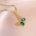 Elegant gold butterfly necklace with green pear-shaped gemstones and zircon accents - Gold Emerald Teardrop Gemstone Butterfly Style (X2550)