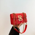 Quilted red faux leather crossbody bag with elegant gold chain and geometric buckle - Red