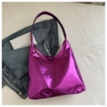 Macro shot of large purple metallic PU tote bag on blue denim and white sheets - Rose Pink