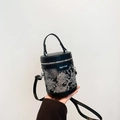Black cylinder bucket bag featuring white floral embroidery and adjustable shoulder strap - Black and Gray