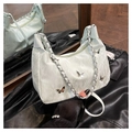 Mint green pleated satin shoulder bag with silver butterfly charms and chain strap - White