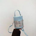 Light blue cylinder bucket bag with floral embroidery and adjustable strap - Blue