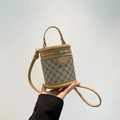 Classic beige monogram cylinder bucket bag with gold hardware and adjustable strap - Khaki
