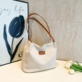 Borsa tote in tela beige minimalista con tracolla in pelle marrone e logo vintage - Marrone