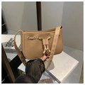 Retro camel brown drawstring shoulder bag with golden eyelets and a vintage texture - Khaki