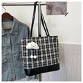 Detail of checkered tote bag featuring a silver bow accent and white cloud plush charm - Black Plaid (Without Pendant)