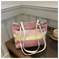Colorful striped woven tote bag with white leather straps and silver metal ring accents - Pink