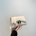 Elegant white leather chain bag with a gold T-shaped lock for a modern stylish look - White