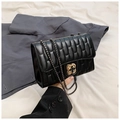 Chic black quilted crossbody bag with golden flower lock and sleek metal chain strap - Black